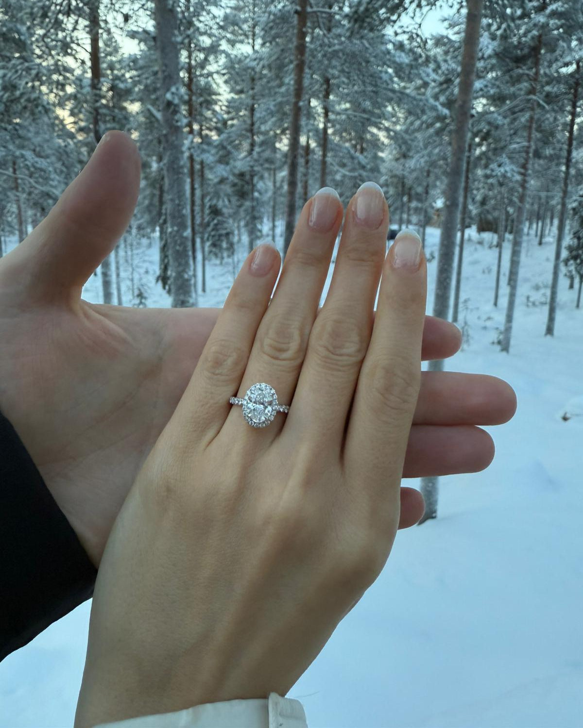 Oval Shaped Diamond Ring, in Halo Setting