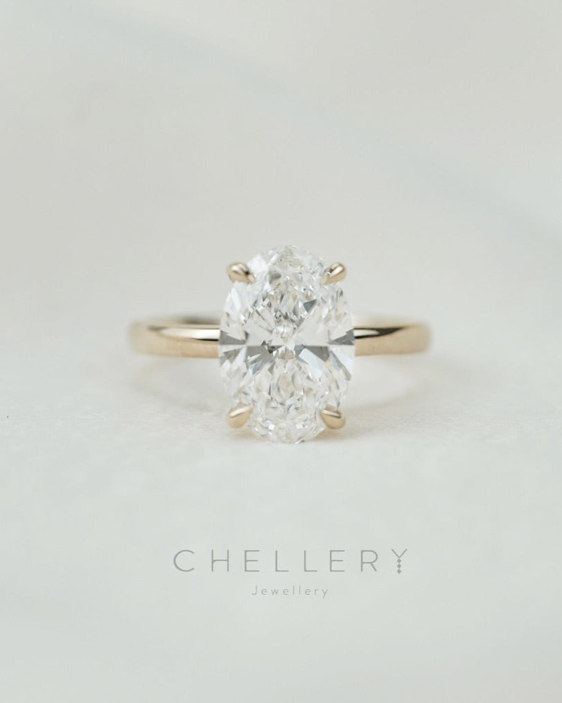 4 Prong Oval-shaped Diamond Engagement Ring
