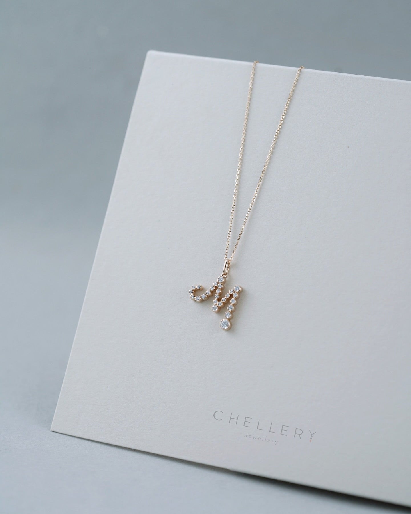 The Chellery Little Lightbulb Initial Diamond Necklace