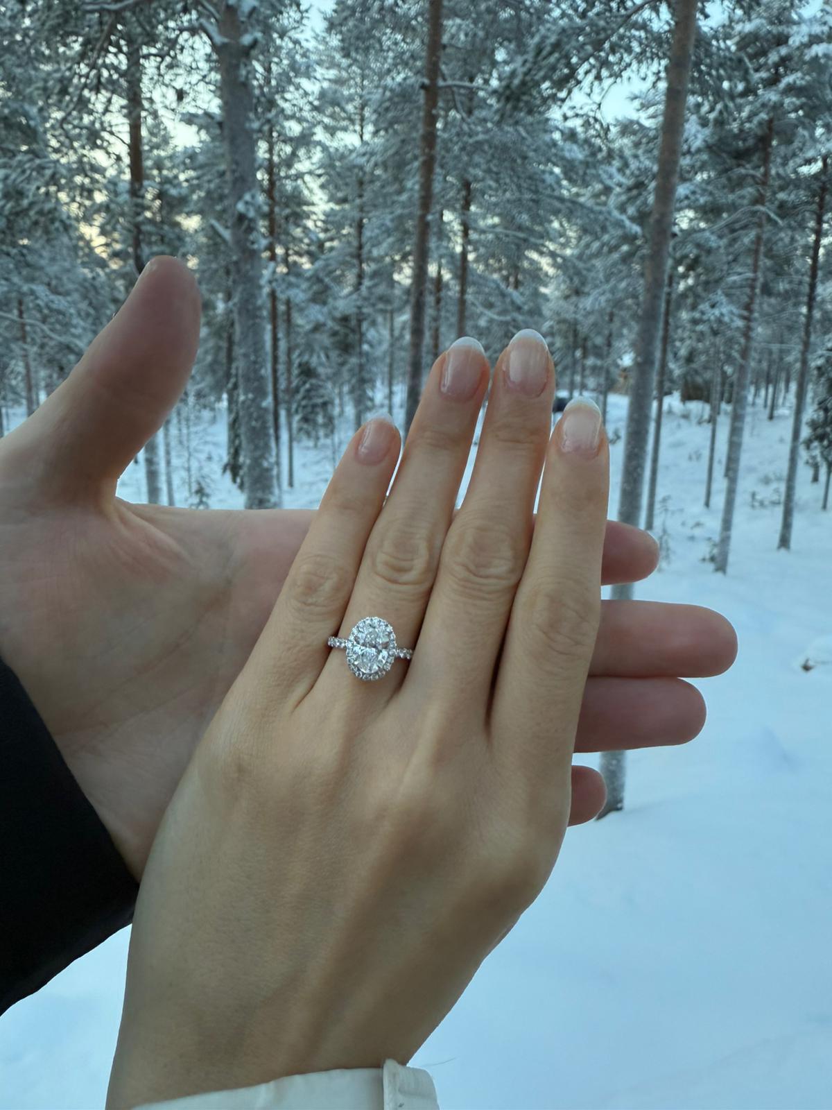 Oval Shaped Diamond Ring, in Halo Setting
